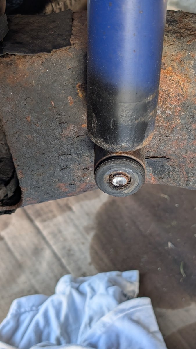 Front lower shock mount