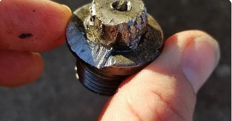 Chiseled oil drain bolt.JPG