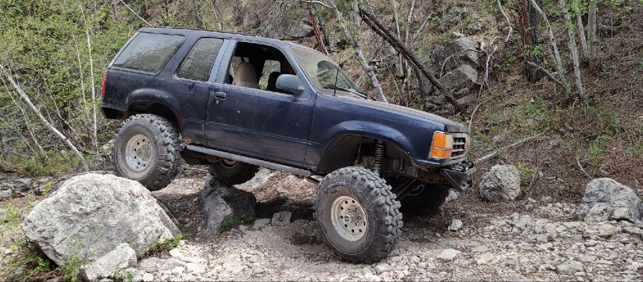 Ultra cheap offroad race Explorer turned rock crawler
