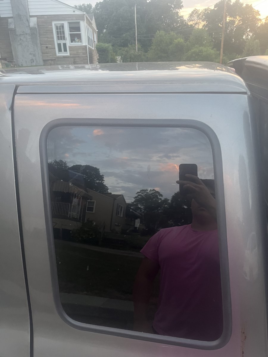 Rust under trim above rear “seat” windows