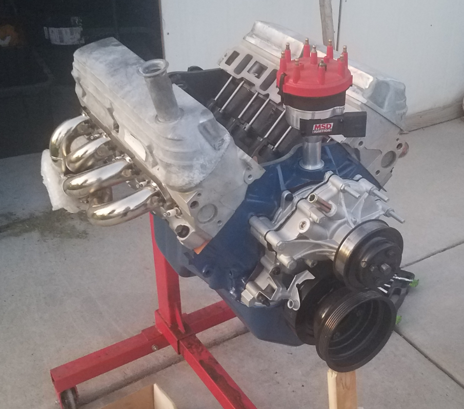31487