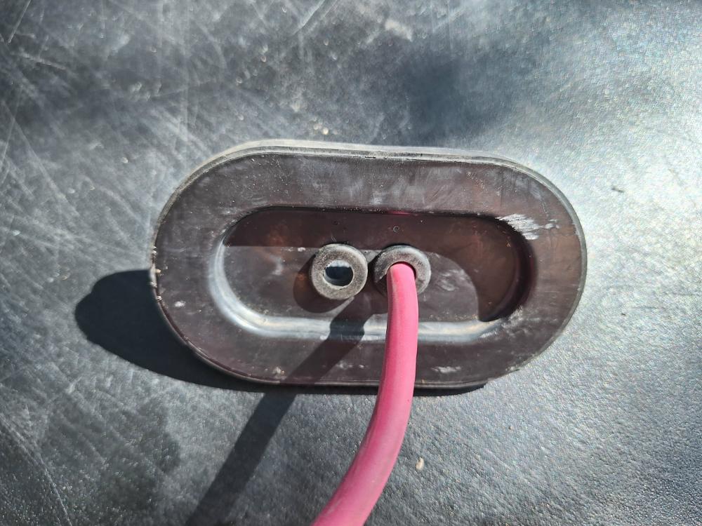 running_battery_cable_into_ford_ranger_truck_bed.JPG