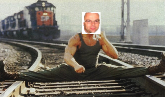 van-damme-splits-on-train-tracks-e1314816324438.png