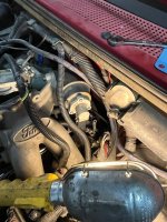 Need help with this black wire with green stripe