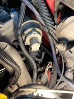 Need help with this black wire with green stripe