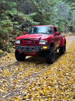 Extended upper control arms