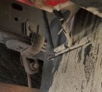 right side outside of mud flap -- note bracket.jpg