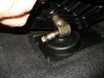 45 Mazda Transmission shifter wedge pin removed with nut still in place to break loose wedge pin.jpg