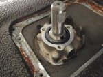 50 Mazda Transmission shifter stub shaft with upper wave washer and shim in place on it.jpg