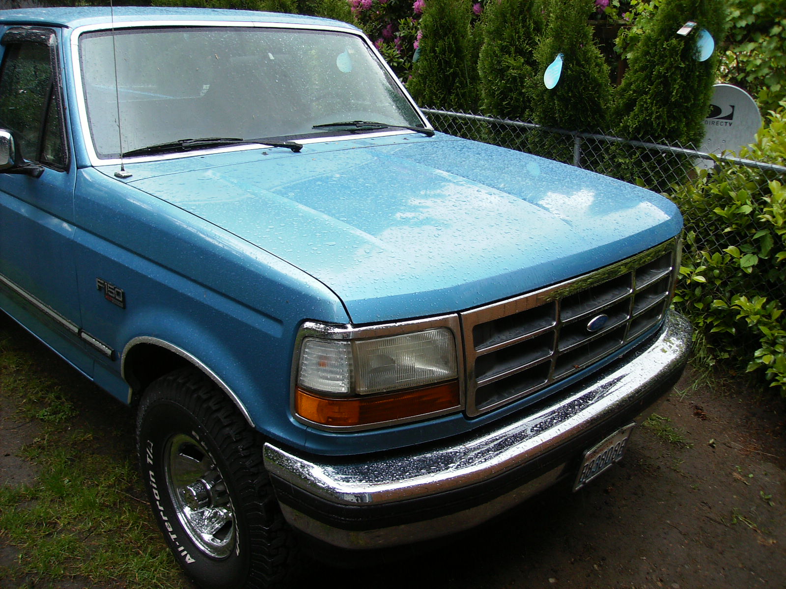 My 93 f150s front end and passenger front side view.
