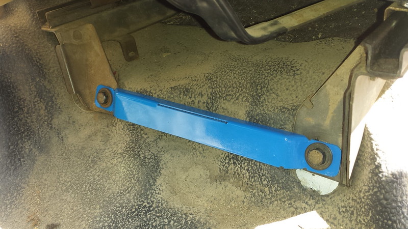 Flashlight mounted to seat mountng bolts.