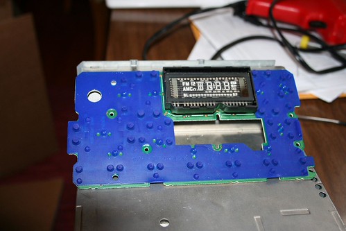 Taking out and taking apart stock radio