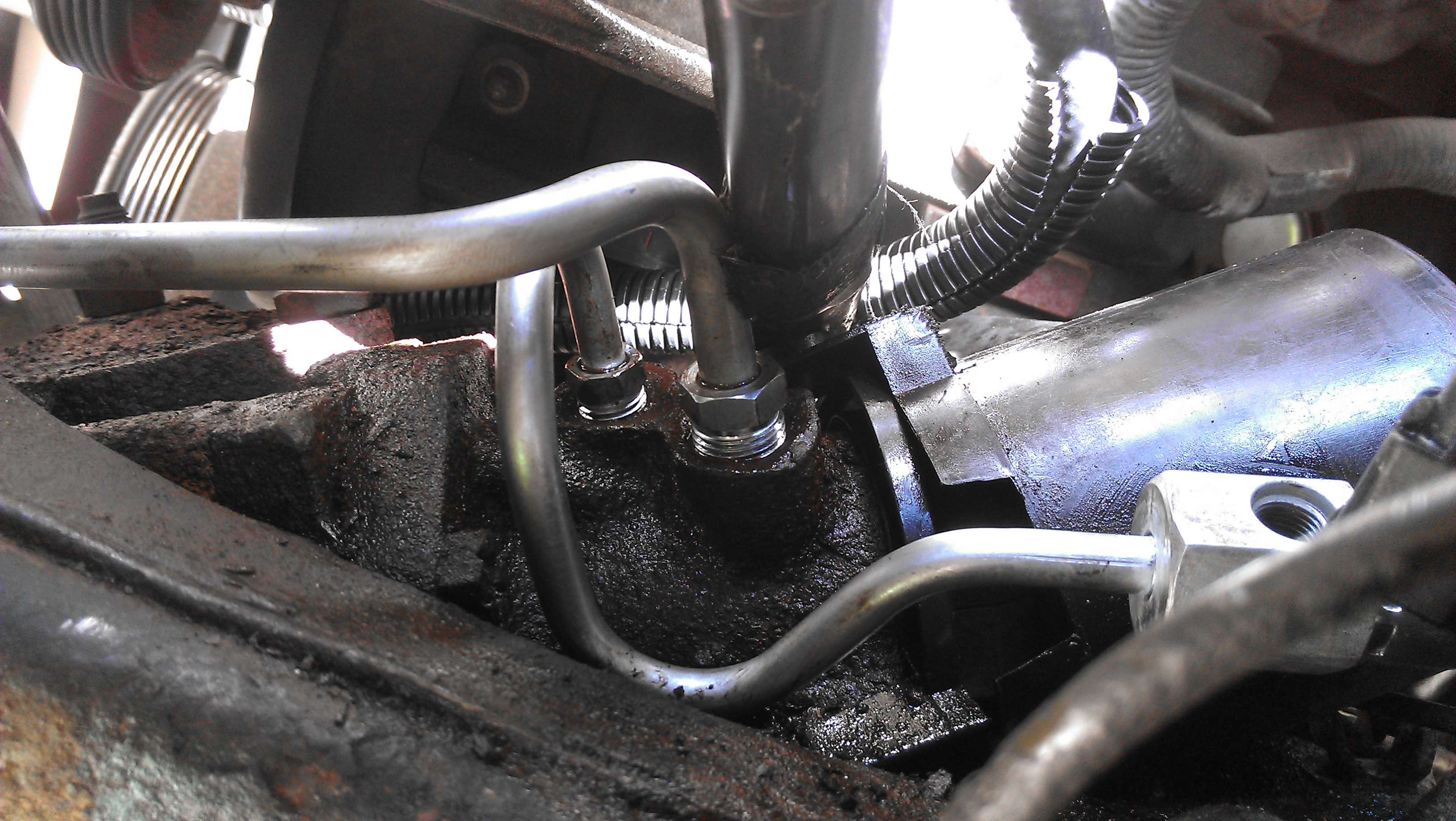 Power steering fluid leak from pressure switch wire connector