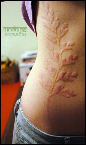 Anyone have any 'Name' tatoo's?
