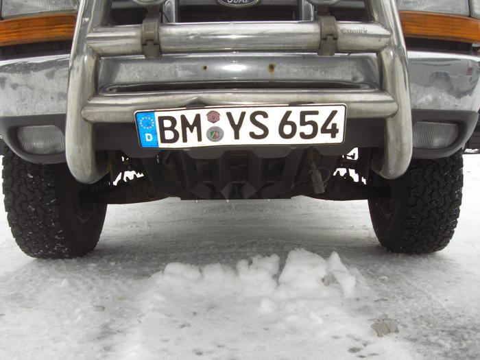 skids to protect the radiator