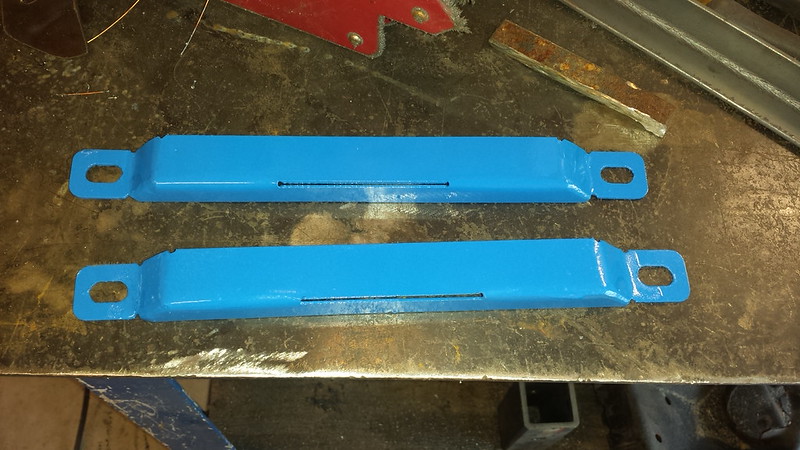 Flashlight mounted to seat mountng bolts.