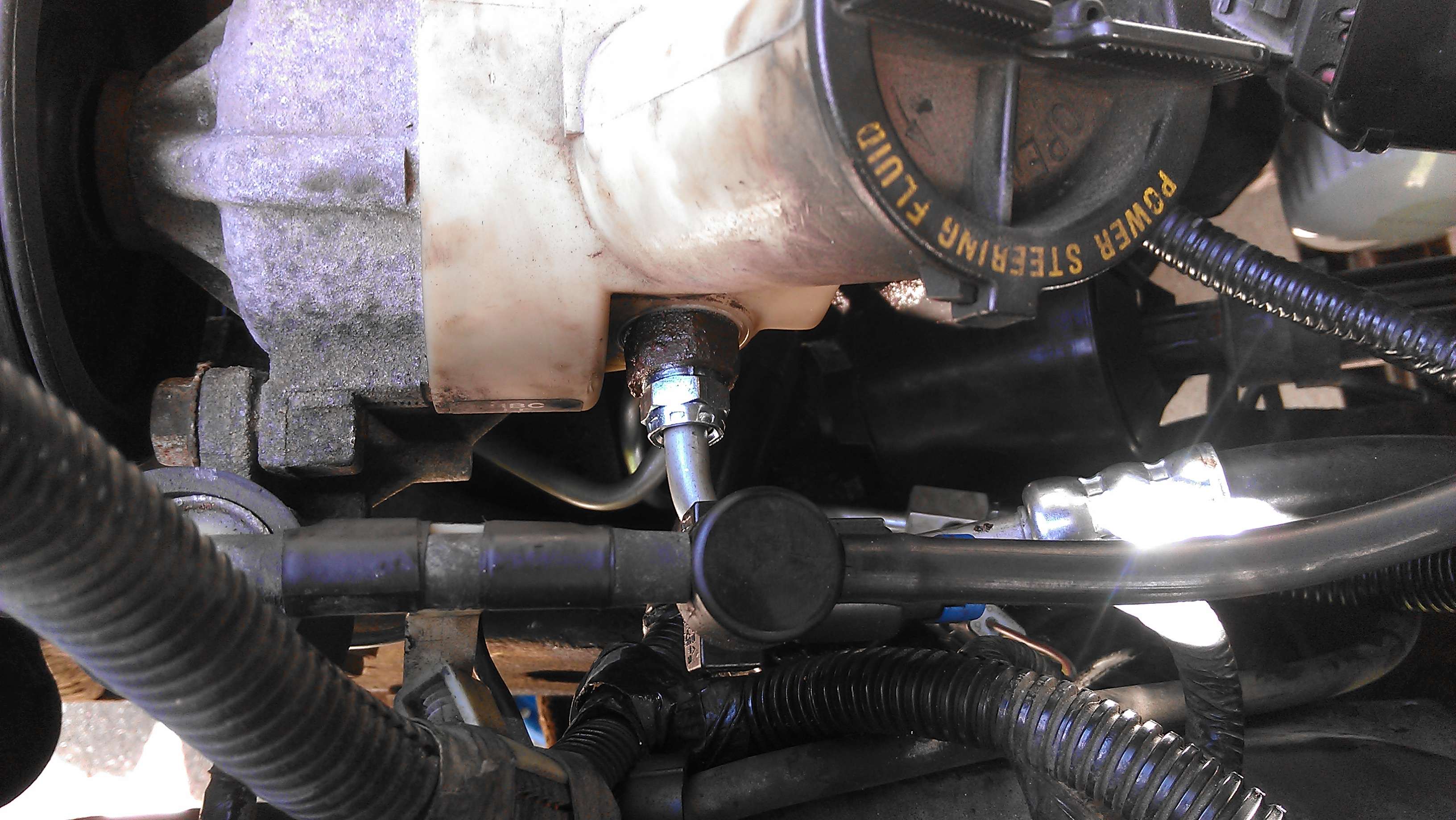 Power steering fluid leak from pressure switch wire connector