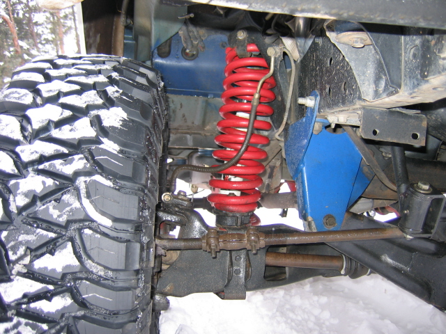 Skyjacker lift coil spring on a Ford factory coil spacer - passenger side