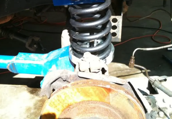 Ford Bronco lower coil spring mount installation
