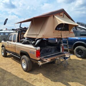 Rear driver-side view of Rick Gonzalez’s 1987 Ford Ranger Overlander parked outdoors.