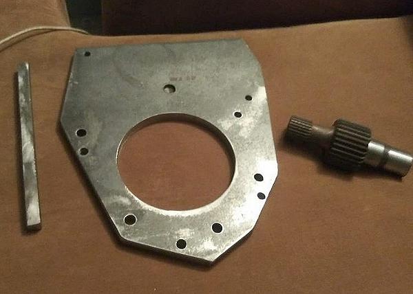 adapter plate with adapter shaft and filler piece