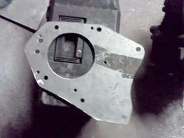 holes cut in adapter plate