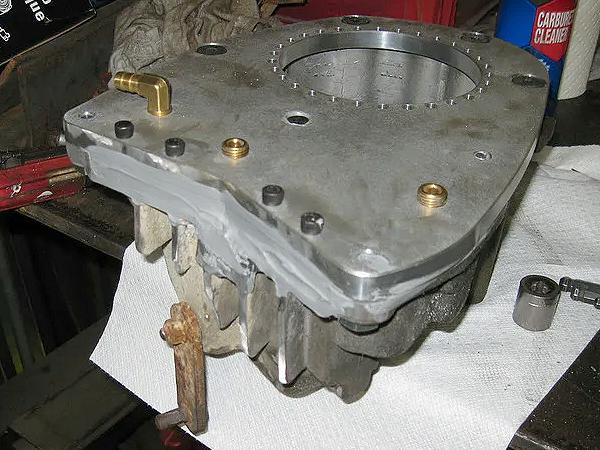 Here's the case after the aluminum blocks are added and sealed with JB Weld