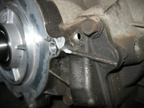 Case ground to allow 90-degree elbow to be installed