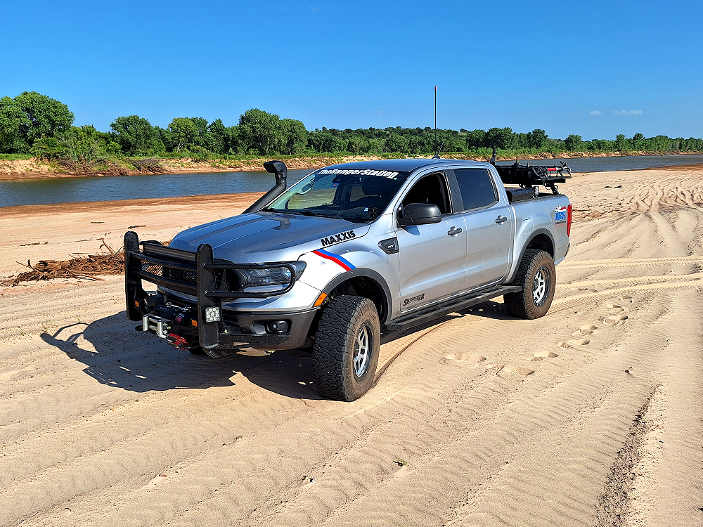 Ford Ranger FX4 with Maxxis RAZR AT tires in deep sand along the Red River