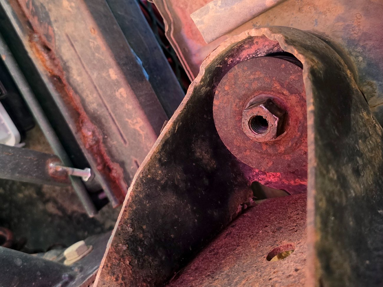 Separate the lower and upper portions of the bushing and sleeve assembly from each other