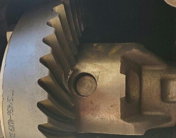 Ring gear teeth ground down for cross pin clearance