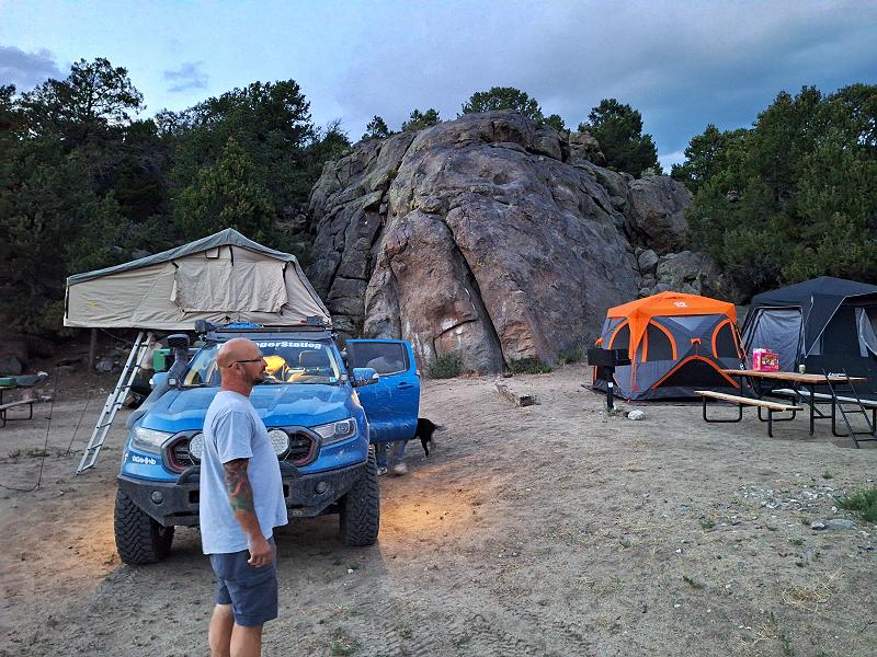 Ford Ranger Tremor with roof top tent next to ground tents