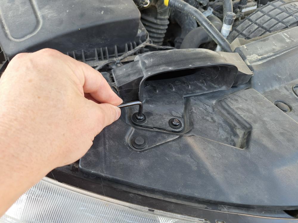 Remove and discard the air intake duct