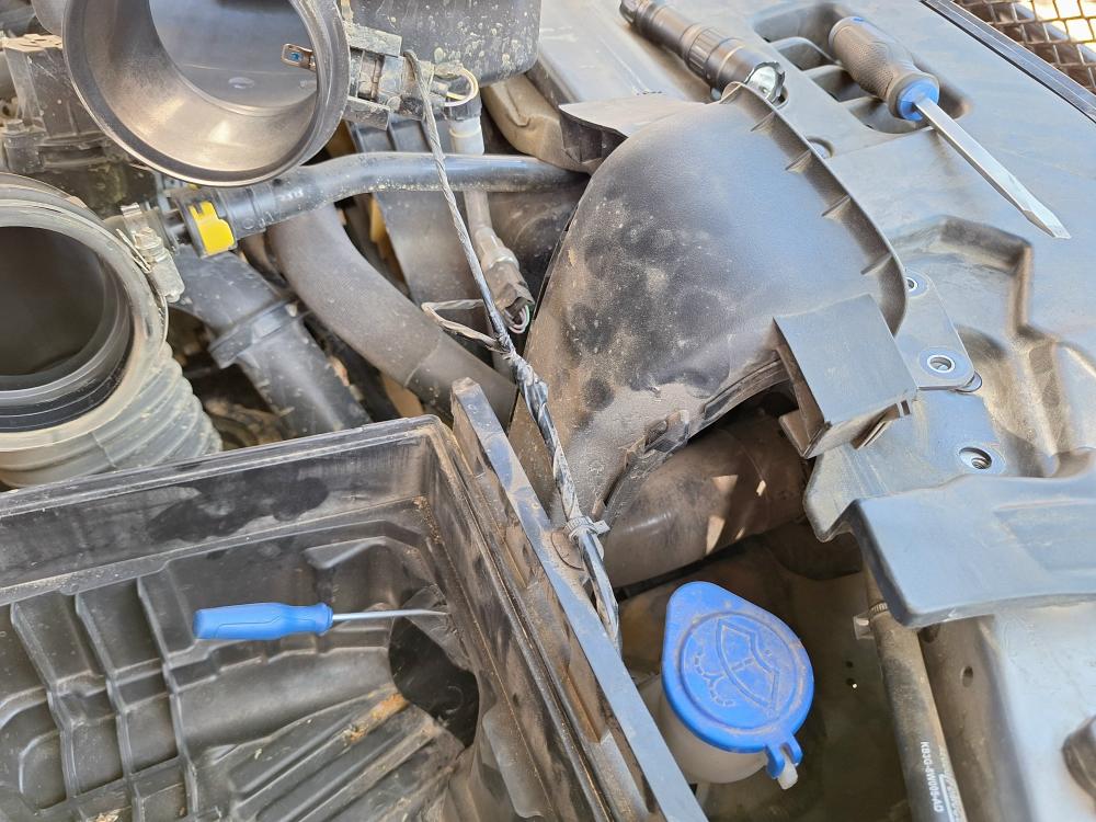 Remove lower intake duct from the air box