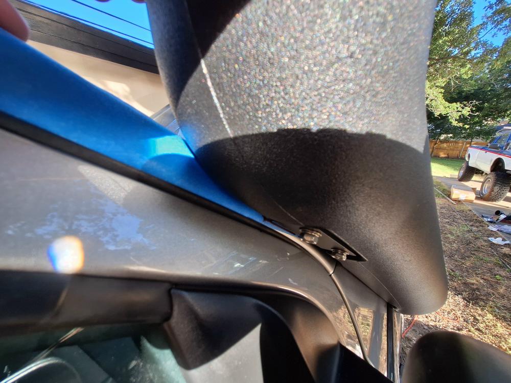 With the snorkel body positioned, open the door to make sure it clears