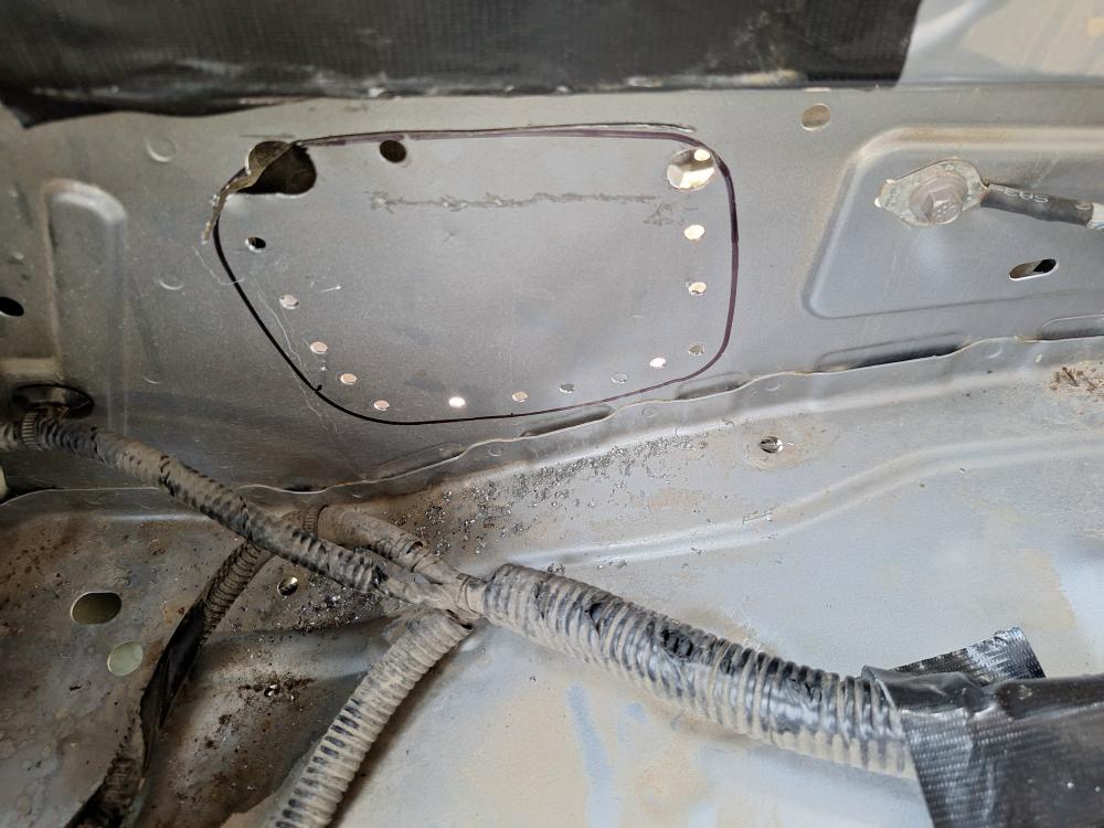 I tried cutting it with the jigsaw, and it was a pain. I found that if I drilled larger holes close together there was less metal to cut.