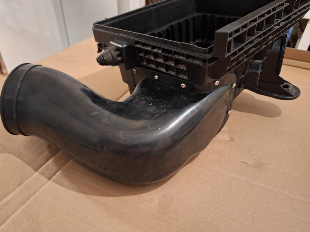 Snorkel hose attached to the air box