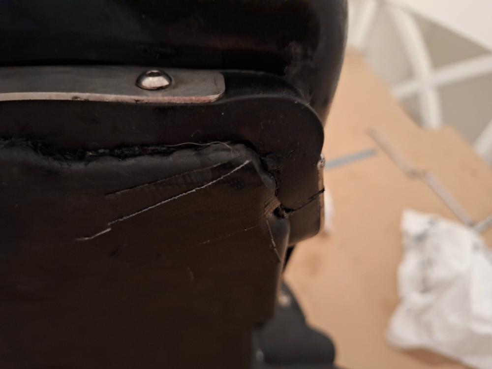 I covered the hole on the bottom of the air box with Gorilla Tape. This tape is strong and holds up well