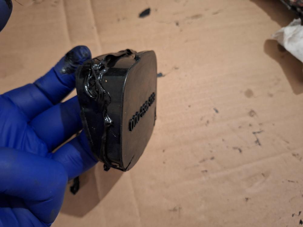 ARB includes a rubber plug to fill the opening left by the factory air intake. You have to apply Sikaflex to the plug to help seal it