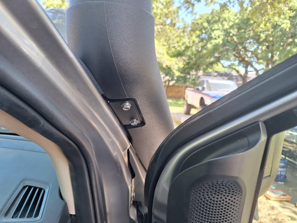 Bolt the snorkel to the fender, and then bolt it to the upper mount that you riveted on to the A-pillar