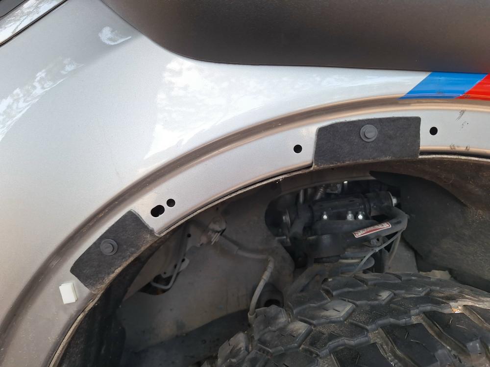 fender liner held in place with new retaining clips