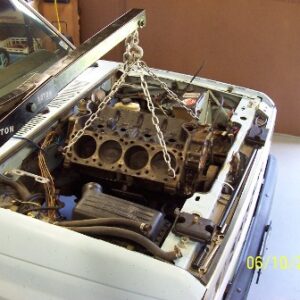 Squeezing it in for the first time.  Actually went in very easily since the core support was already notched.