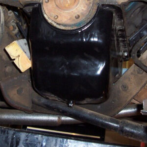 I basically positioned the engine for optimum clearance in all the critical areas, oil pan, firewall, etc except for the filter mount.  A screw-on filter relocator will not be used.  Rather, I will attach the oil lines for the filter relocator directly to the block.  Big thanks to the guys at www.460ford.com for the info on how to do that because that is what let me plop this motor where it really needs to be in the chassis.


Passenger I-beam gets close to the front side of the oil pan.