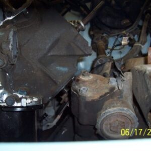 Front view of oil filter pad and steering box. Most 460 Rangers you will ever see have the firewall notched, so engine can be set back and the filter mount would be located behind the steering box