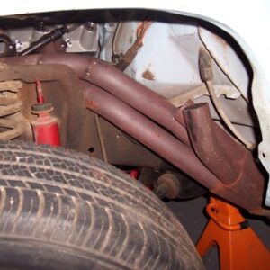 I tucked to back and down and rotated it slightly so these two tubes would fit between the shock tower and the body.