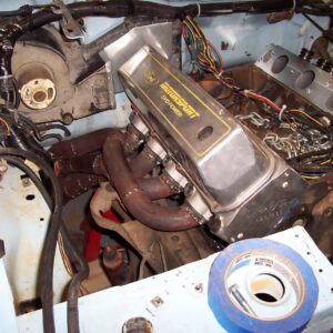 Well I couldn't stand it.  I just HAD to rebuild the passenger's side header.  I am much happier with it now.