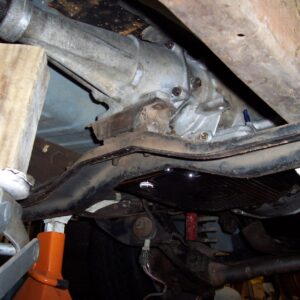 After moving the crossmember mounting brackets to the front set of factory drilled holes, the trans mount lined up perfectly. It's almost like Ford intended it to work this way.