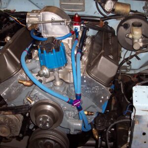 New and improved fuel line routing.  Well away from the headers