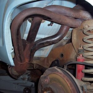 As you can see here, unmodified, the Nova headers were about 3-4" too wide for this truck