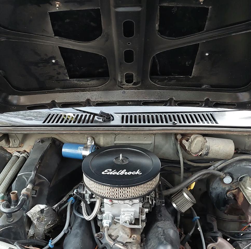 Underside of hood and Ford 2.8 V6 Edelbrock air cleaner